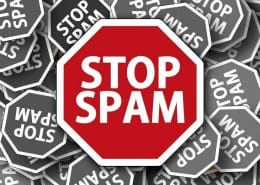 Graphic of a stop sign that says STOP SPAM