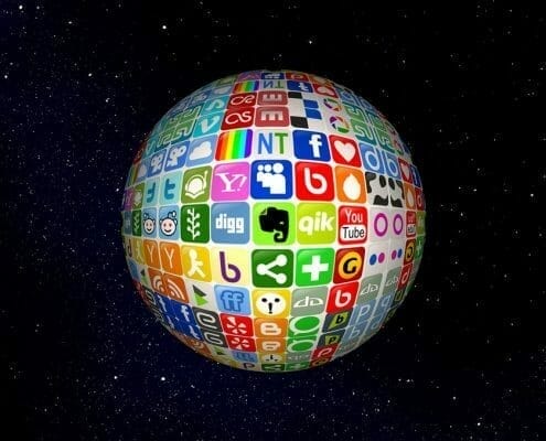 Graphic of the earth covered in icons depicting numerous online Social Media entities.