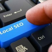 A blue key with the words Local SEO on a computer keyboard