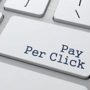 The words Pay Per Click written on a computer keyboard key