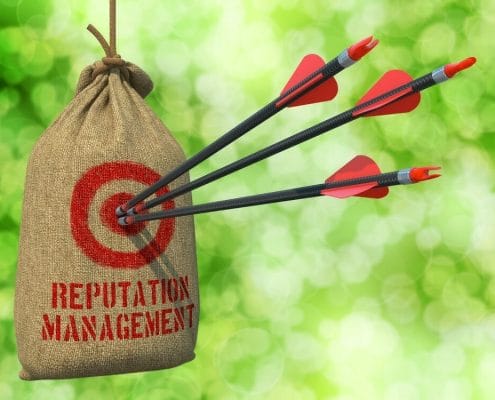 Three arrows that hit the bullseye on a bag that says Reputation Management.