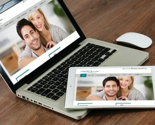 Dentistry on Ellesmere website displayed on laptop and tablet.