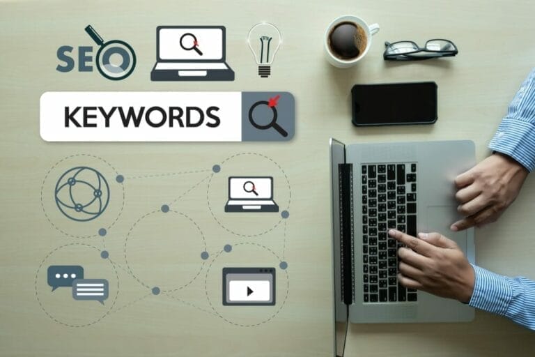 Graphic layout of SEO keywords with man searching on laptop computer