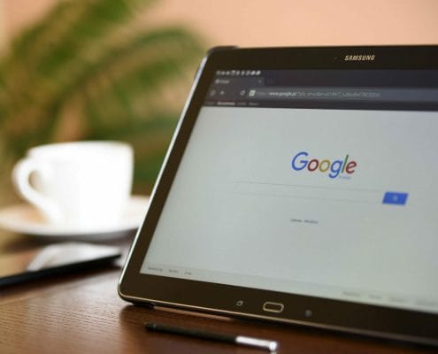 Google home page showing on a table screen