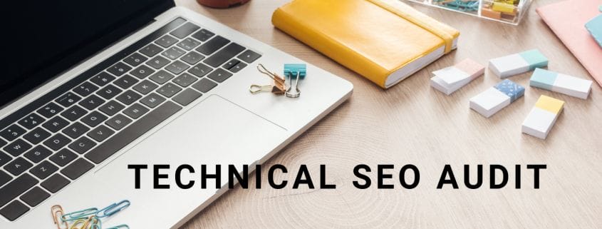 technical seo audit words over laptop and notepads