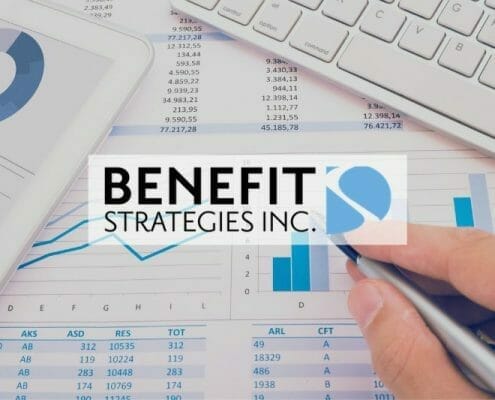 Benefit Strategies Inc. featured image showing data spreadsheets beside a computer keyboard.