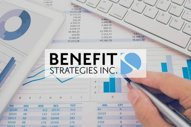 Benefit Strategies Inc. featured image showing data spreadsheets beside a computer keyboard.