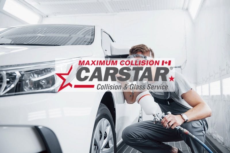 Maximum Collision featured image of a man painting a car white in a paint booth.