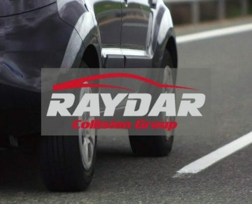 Raydar Collision Group logo over image of a vehicle on the road