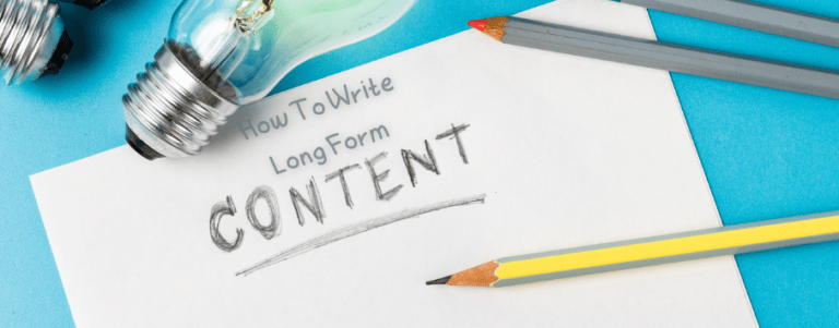 Light bulbs, pencils, and a sheet of paper that reads "How to Write Long Form Content."